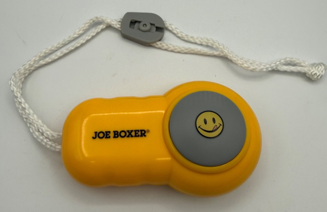 Joe Boxer Brand Hand Massager – Yellow Plastic with Hanging Cord