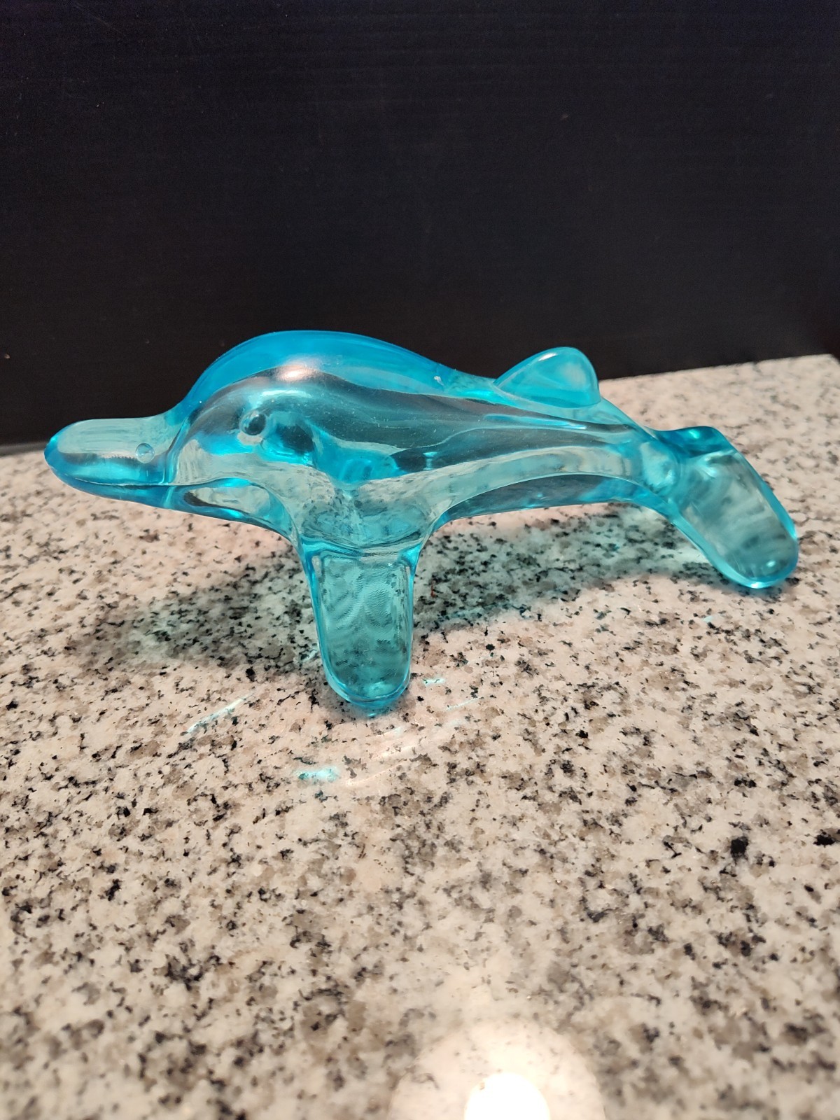 Body Muscle Massager. Translucent Dolphin Shaped Massager. BRAVA.