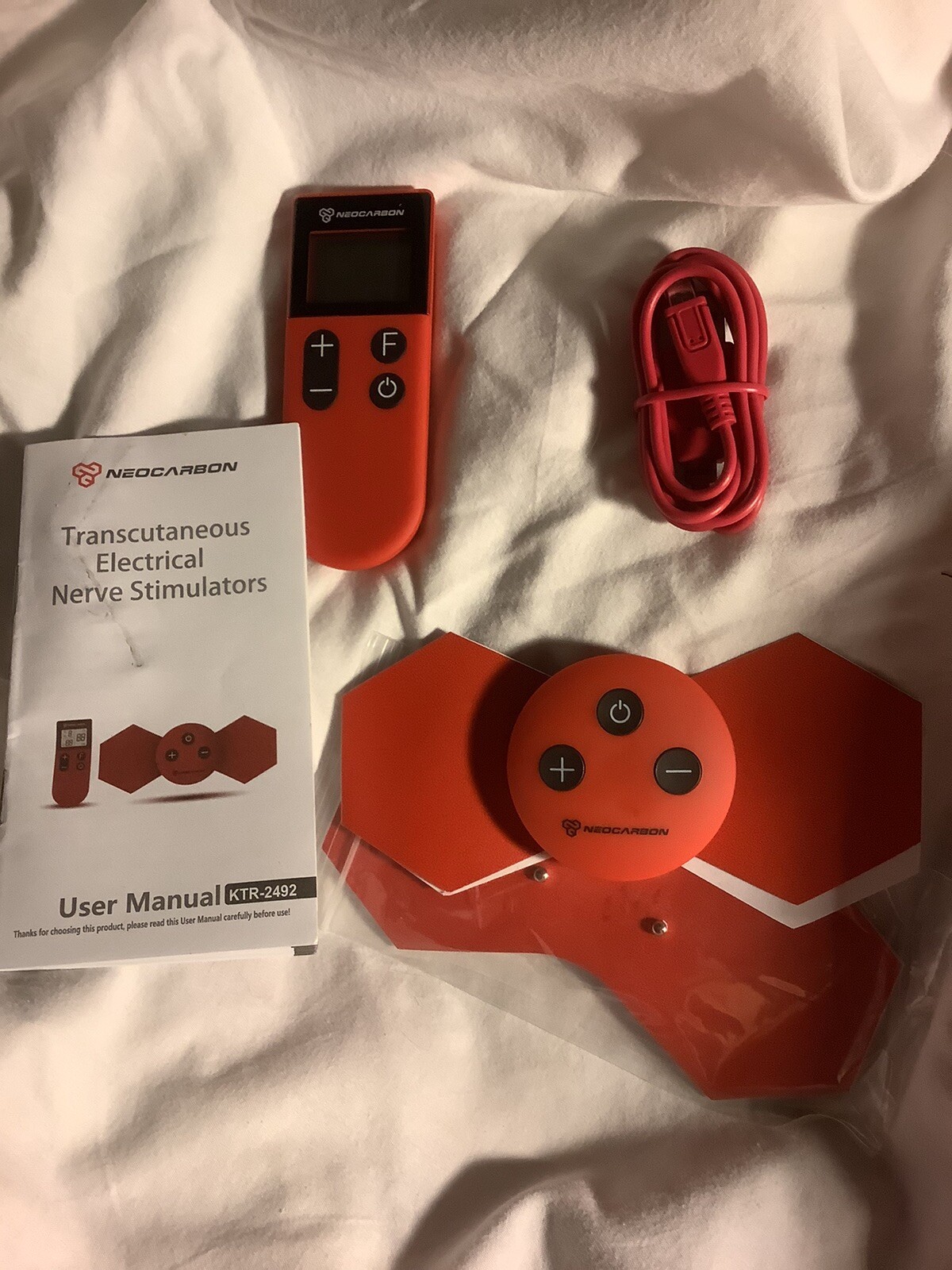 NEOCARBON TRANSCUTANEOUS ELECTRICAL STIMULATOR, NEW IN BOX, MODEL KTR-2492