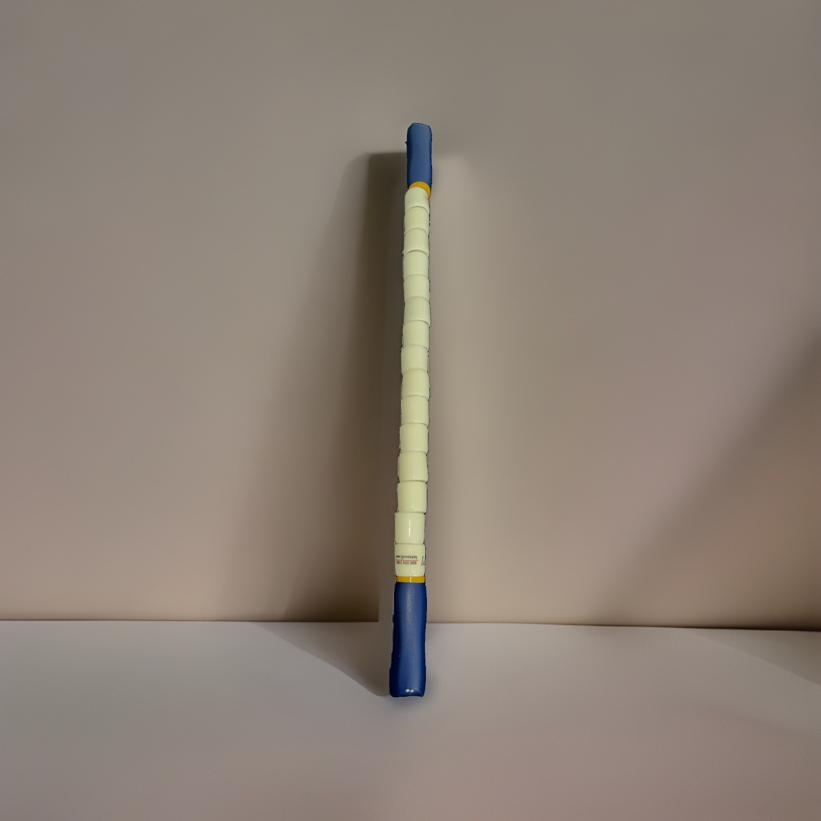 The Stick 24″ Stiff Flexible Stick Massage Roller White Blue Handles 15 Beads