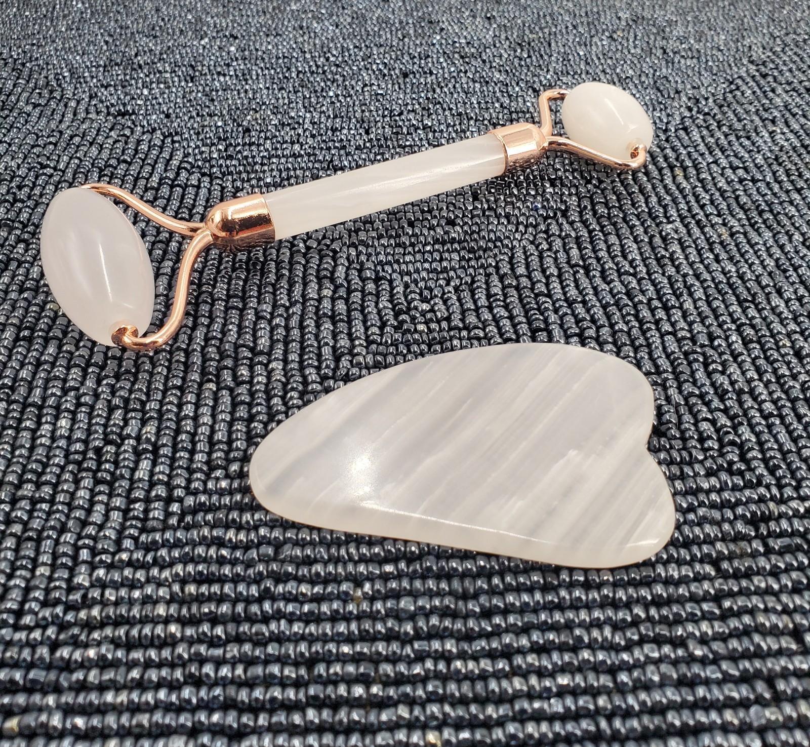 Jade (Pink) quartz facial roller and a gua sha stone (C39)