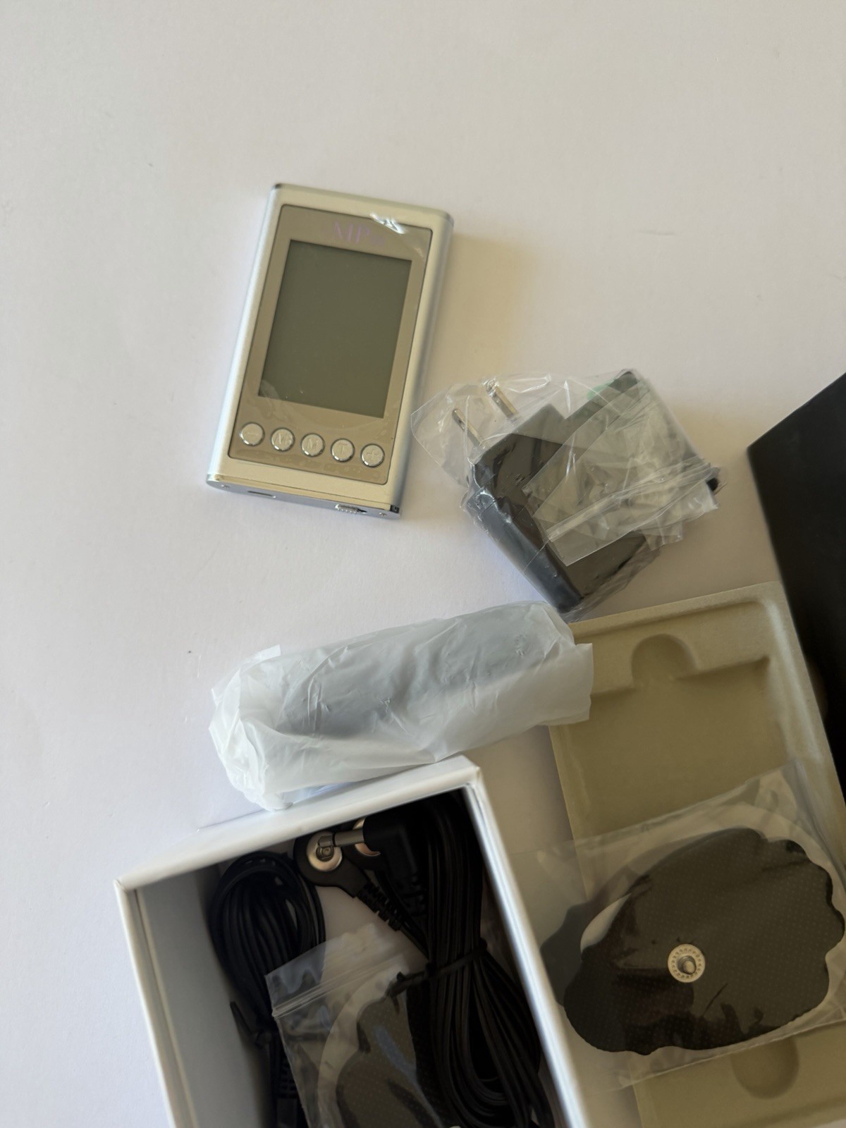 eMP10 TENS/EMS Portable unit in Silver Brand new