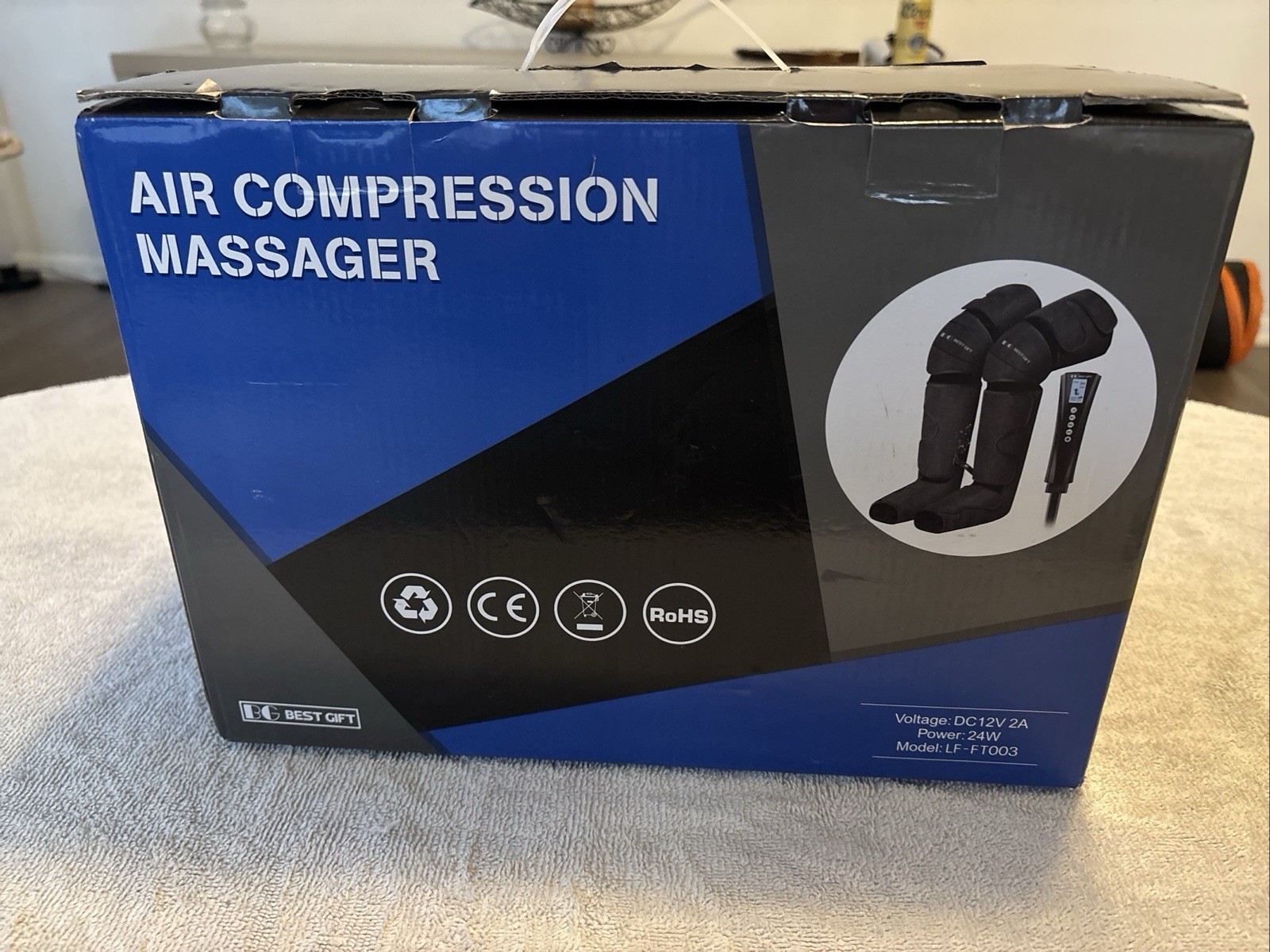2 item lot containing heated massage,support brace and air compression leg unit