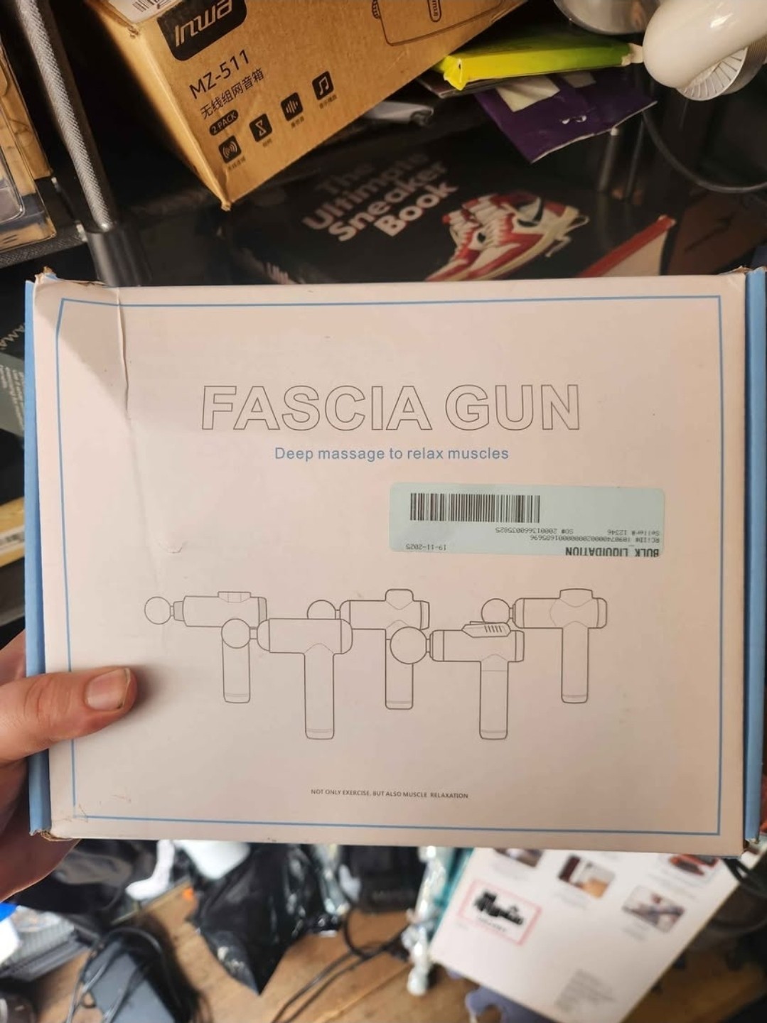 Untouched new Fascia massage gun in green color with multiple heads and settings