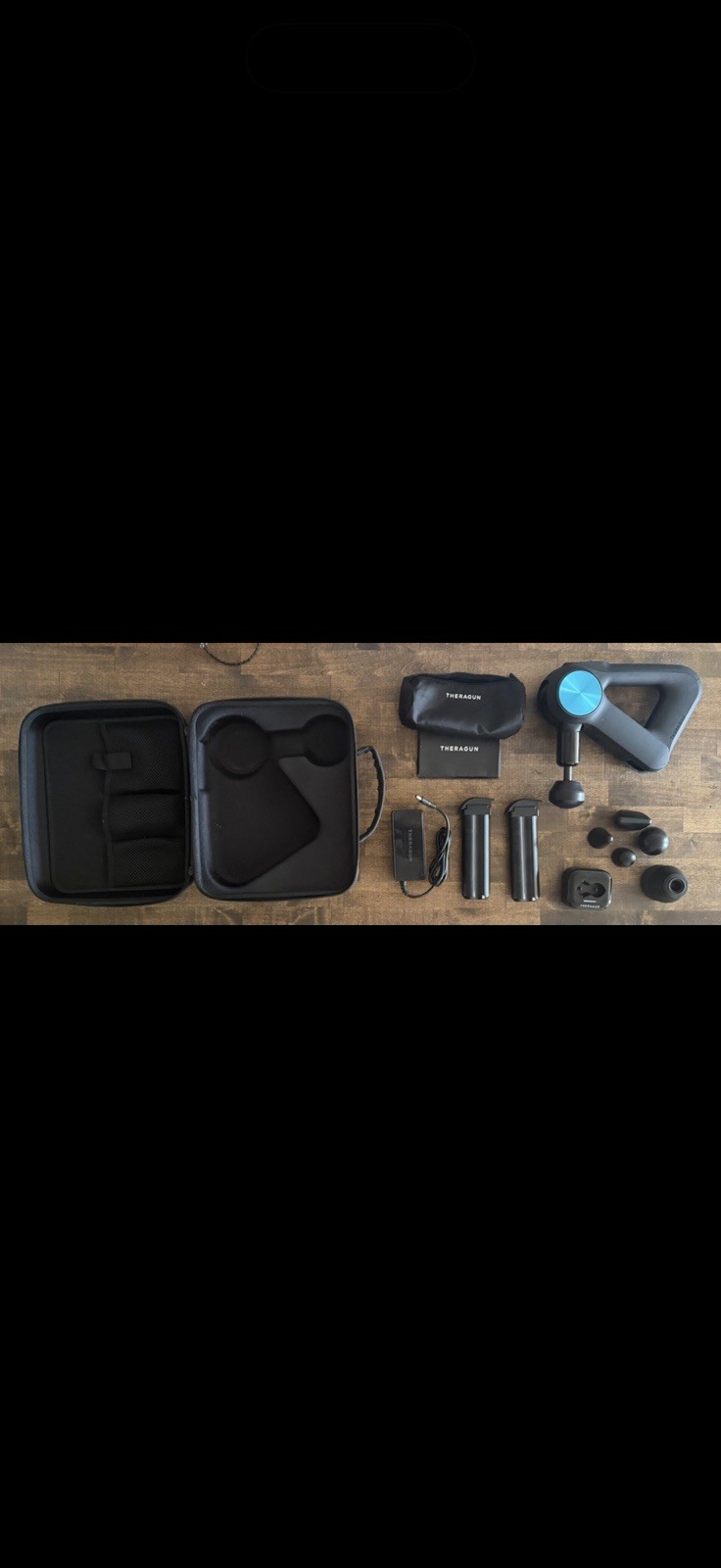 Theragun Pro Percussion Massager with 2 Batteries and Charging Stand