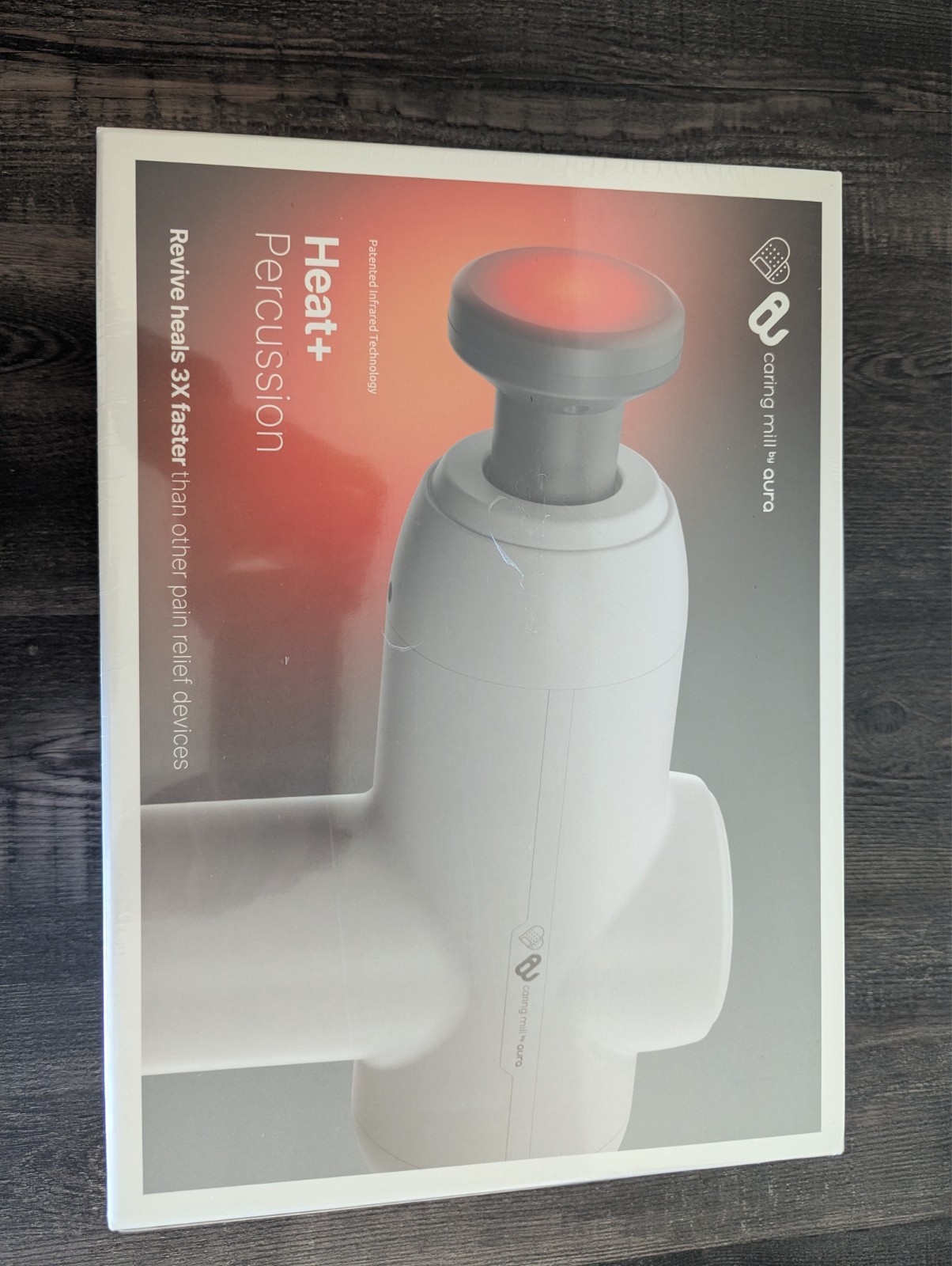 Revive Heated Massage Gun — Caring Mill™ by Aura Shop more Caring Mill™ by Aura