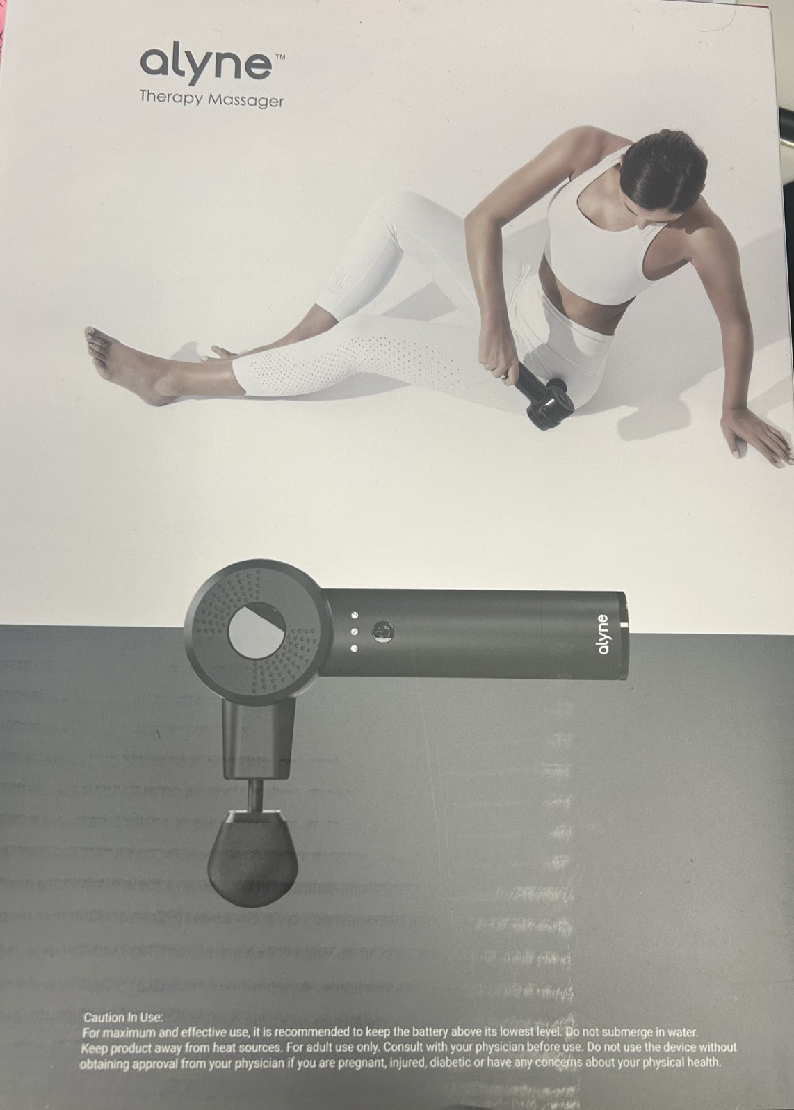 Alyne Therapy Massager, a handheld and cordless percussion massage gun MSRP $299