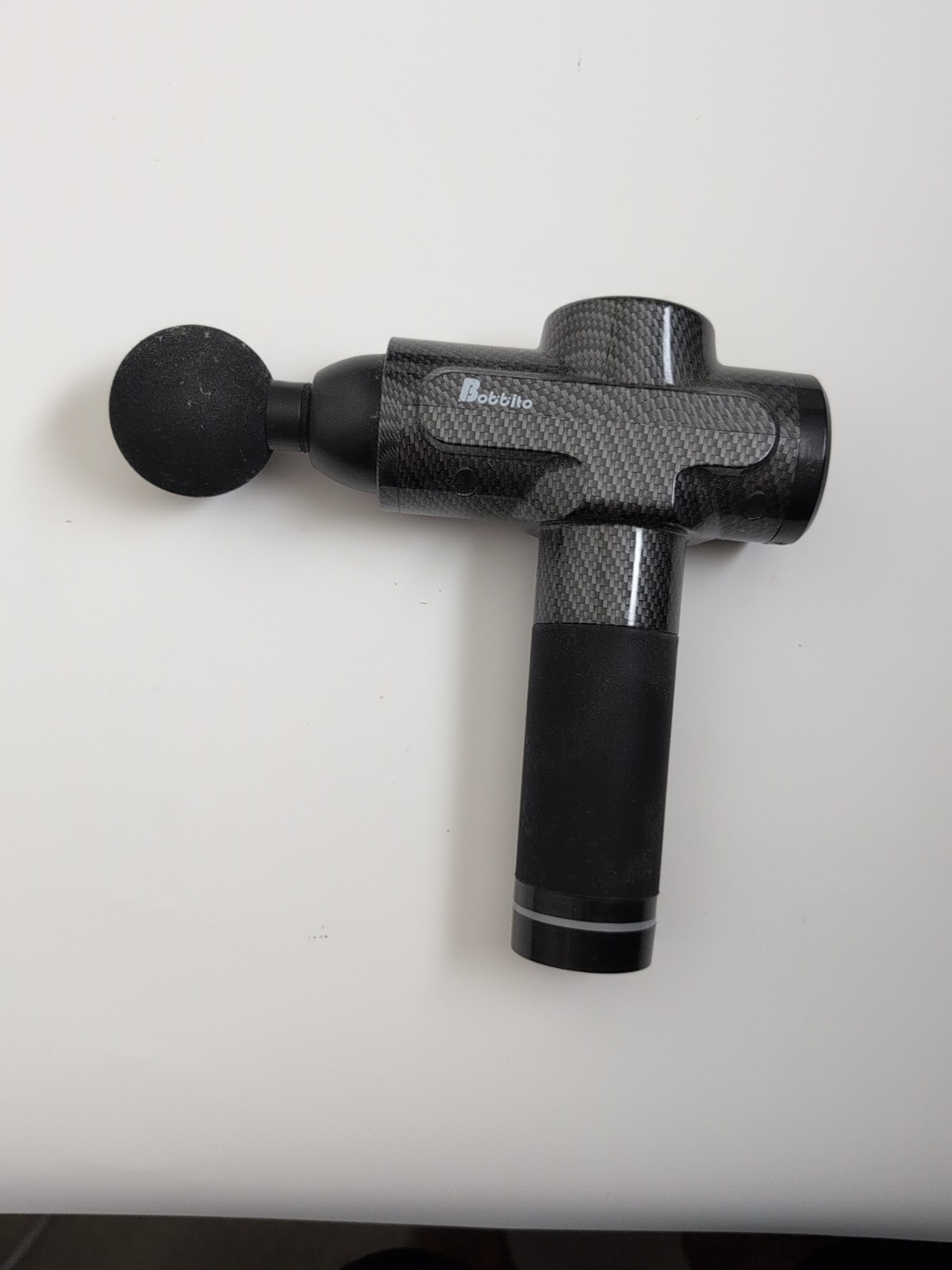 Massage Gun Bobbito 24V 2500mAh Carbon Fiber – Works – Missing Charger