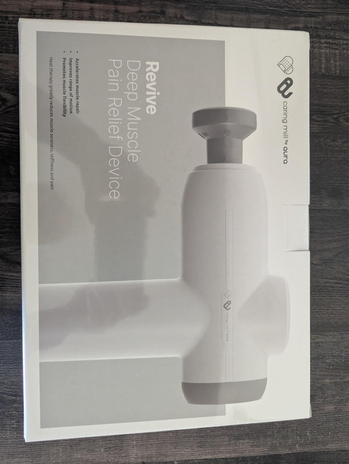 Revive Heated Massage Gun — Caring Mill™ by Aura Shop more Caring Mill™ by Aura