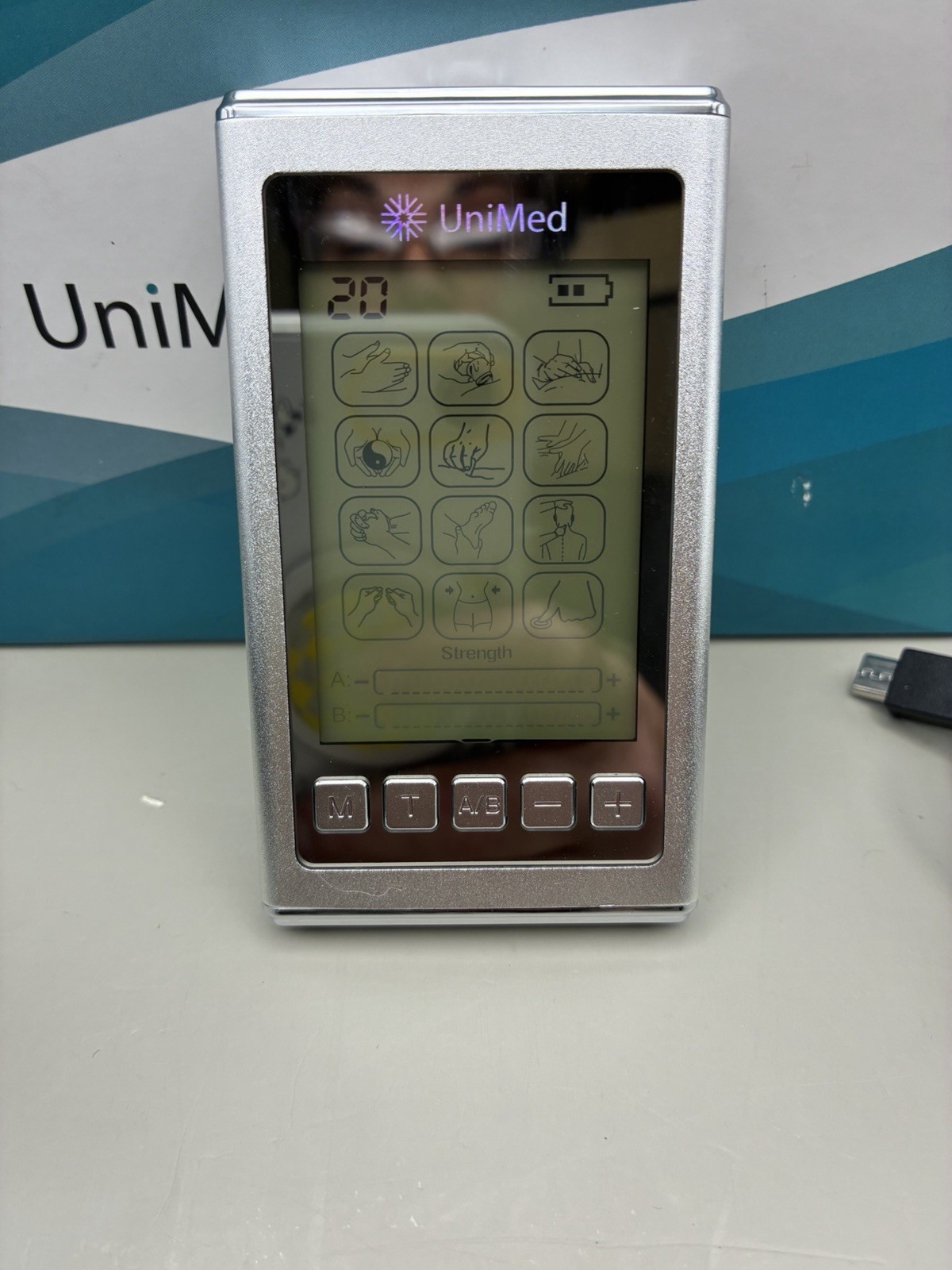 UniMed ProX SM TENS and PMS Massager – Shoes Included