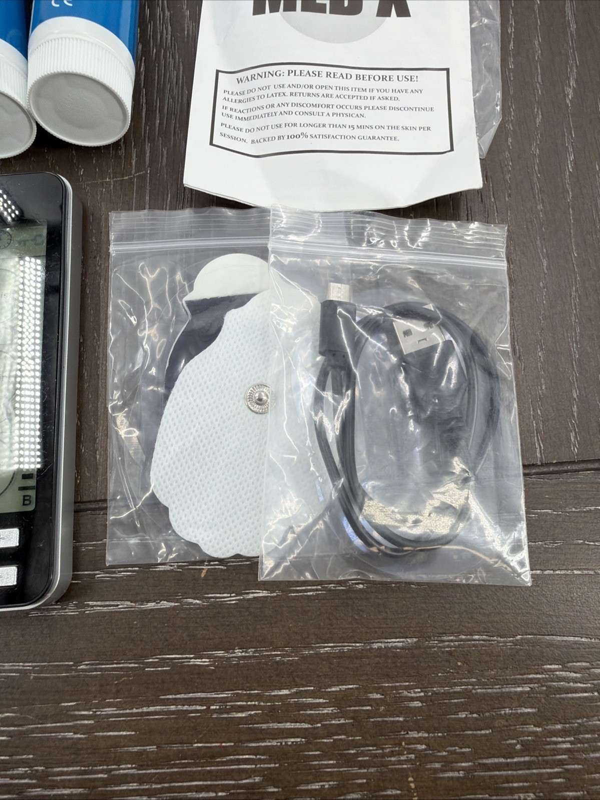 TENS EMS Muscle Massager Rechargeable Electronic Pulse Device.