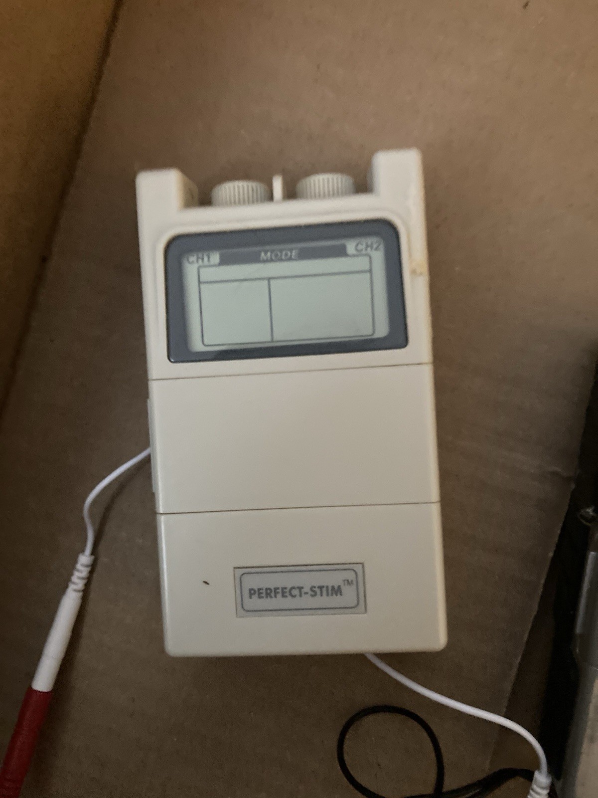 2 Used Tens 7000. 1 Gray 1 White, Wires And Cords. 3 Bonus DVD.